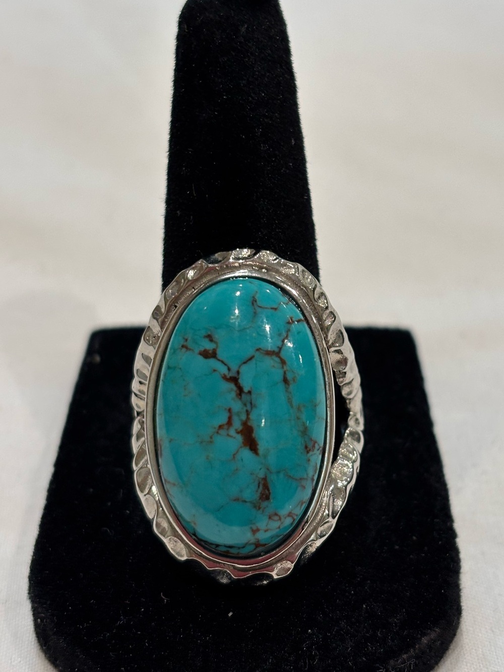 Stainlesssteel ring adorned with beautiful turquoise. Signed GSJ stainlessteel.